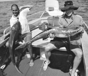 Double header of black kingfish or cobia made the day for these visitors to Townsville.
